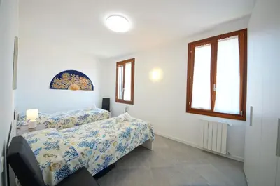Letto o letti in una camera di DolceVita Apartments N 515 Redentore