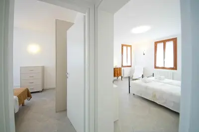 Letto o letti in una camera di DolceVita Apartments N 515 Redentore
