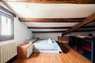 Letto o letti in una camera di Petit Loft
