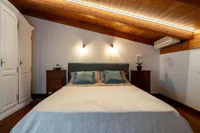 Letto o letti in una camera di 7° Cielo Apartment - Venezia - Mestre with terrace