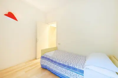 Letto o letti in una camera di Ca' Santa Eufemia, cozy and classy, sleep 4
