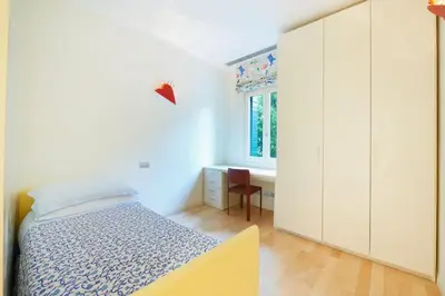 Letto o letti in una camera di Ca' Santa Eufemia, cozy and classy, sleep 4