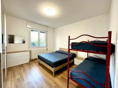 Letto o letti in una camera di Ada 2 - Carraro Immobiliare - Family Apartments