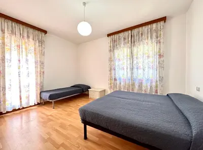 Letto o letti in una camera di Ada 2 - Carraro Immobiliare - Family Apartments