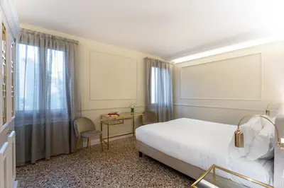 Letto o letti in una camera di San Vio Palace Luxury Apartments