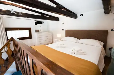 Letto o letti in una camera di Residence Rio Marin