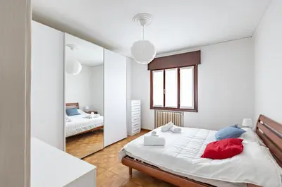 Letto o letti in una camera di GuestHost - Sunset Mestre Apartment