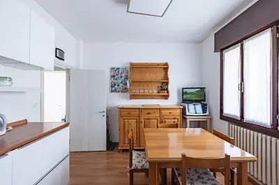 Cucina o angolo cottura di GuestHost - Sunset Mestre Apartment