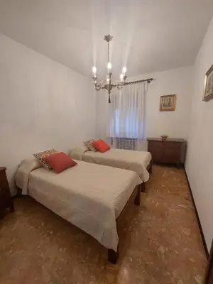 Letto o letti in una camera di Appartamento alla chiesa
