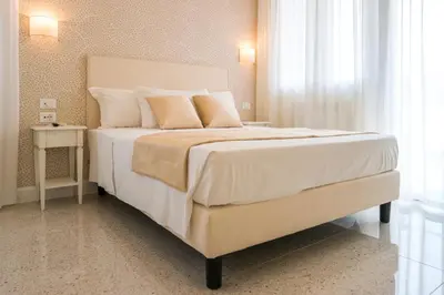 Letto o letti in una camera di Guest House Train Station Venice - Atika & Atif