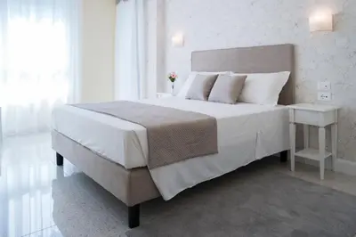 Letto o letti in una camera di Guest House Train Station Venice - Atika & Atif