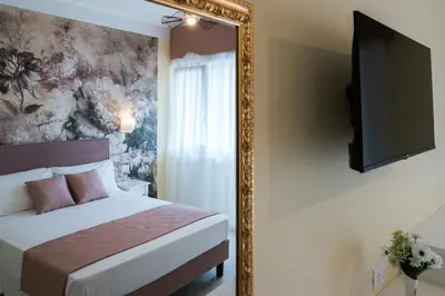 Letto o letti in una camera di Guest House Train Station Venice - Atika & Atif