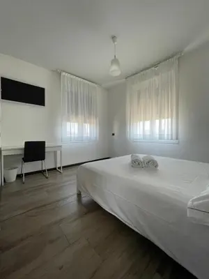 Letto o letti in una camera di Alla Favorita
