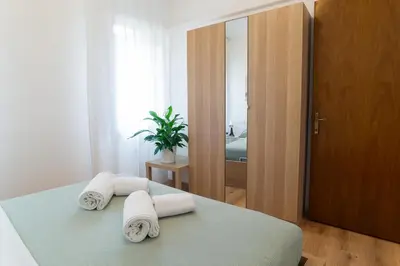 Letto o letti in una camera di Lombardi House