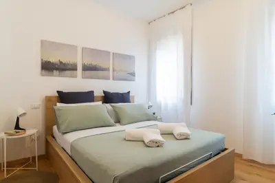 Letto o letti in una camera di Lombardi House