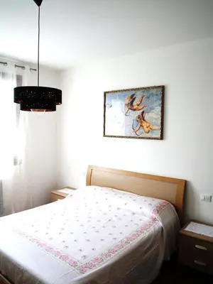 Letto o letti in una camera di Appartamento Diana