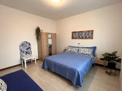 Letto o letti in una camera di Ornella's apartment - Relax near Venice
