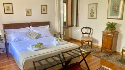 Letto o letti in una camera di Regina dei fiori