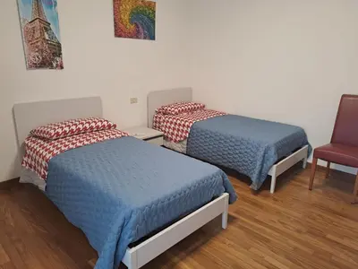 Letto o letti in una camera di Il posto Giusto