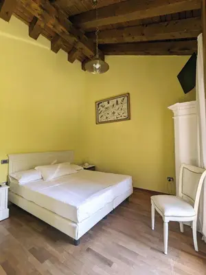 Letto o letti in una camera di Villa Iris