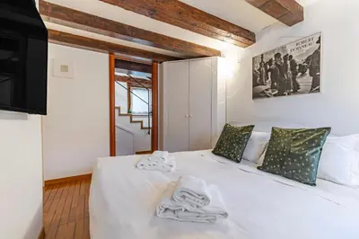 Letto o letti in una camera di Attico San Marco