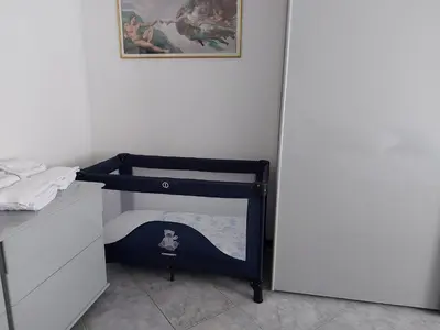 Letto o letti in una camera di INDIGO APARTMENT Cavallino Treporti