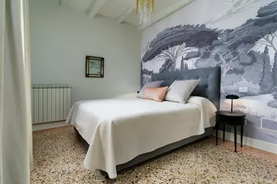 Letto o letti in una camera di Corte della Palma Superb Venetian Garden