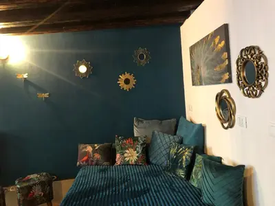 Letto o letti in una camera di La dimora di Sofia sul Canale a San Stae