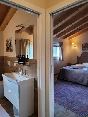 Letto o letti in una camera di La casa di Bruno