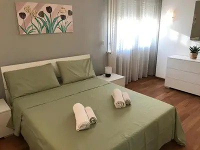 Letto o letti in una camera di Casa Denise