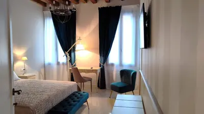 Letto o letti in una camera di Venice San Filippo Apartment