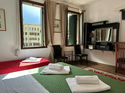 Letto o letti in una camera di Venice Guest House