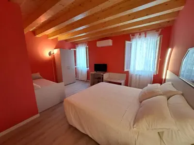 Letto o letti in una camera di Ca Jole