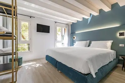 Letto o letti in una camera di Ca' San Carlo Residence by Wonderful Italy