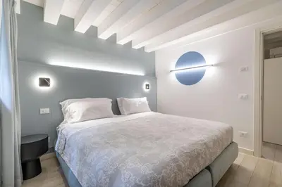 Letto o letti in una camera di Ca' San Carlo Residence by Wonderful Italy