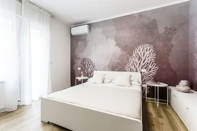 Letto o letti in una camera di La Bella Vita - La Terrazza