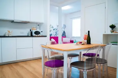 Cucina o angolo cottura di La Bella Vita - Giardino al Mare