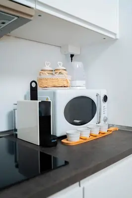 Cucina o angolo cottura di La Bella Vita - Giardino al Mare
