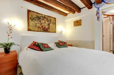 Letto o letti in una camera di Smeraldo Apartment Loc-03081