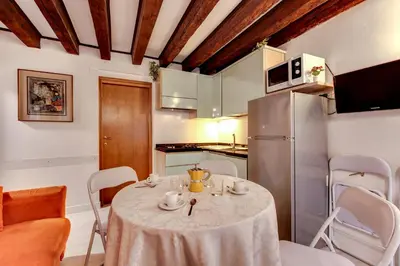 Cucina o angolo cottura di Smeraldo Apartment Loc-03081