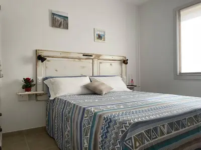 Letto o letti in una camera di Casa Emma