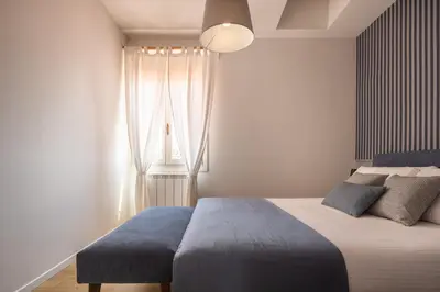 Letto o letti in una camera di Santa Croce Design Apartment R&R