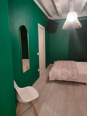 Letto o letti in una camera di Residenza Sant'Andrea Smeraldo