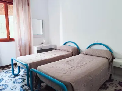 Letto o letti in una camera di Ariston Fronte Mare