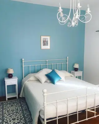 Letto o letti in una camera di Casa Bellona