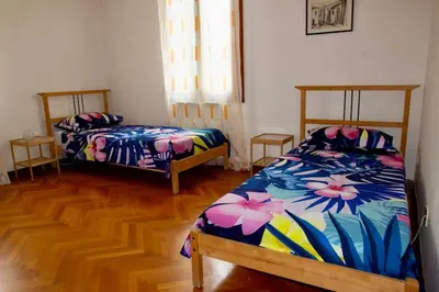 Letto o letti in una camera di Isola del Lido, Luminoso, immerso nel verde, per 5