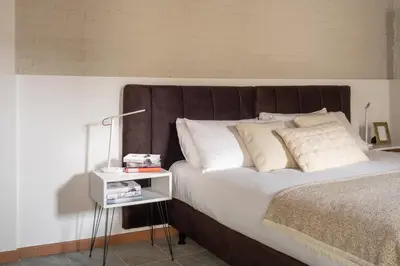 Letto o letti in una camera di Castello Apartment with Garden R&R