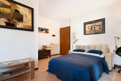 Letto o letti in una camera di L'angolo di Anna