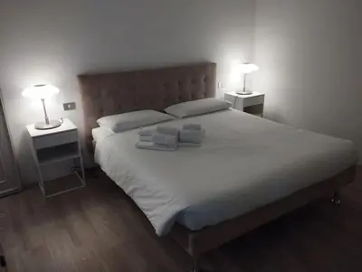 Letto o letti in una camera di Stin House