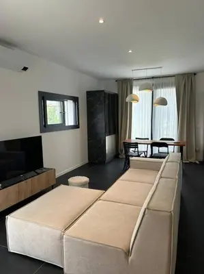 Letto o letti in una camera di Villetta bifamiliare Jesolo